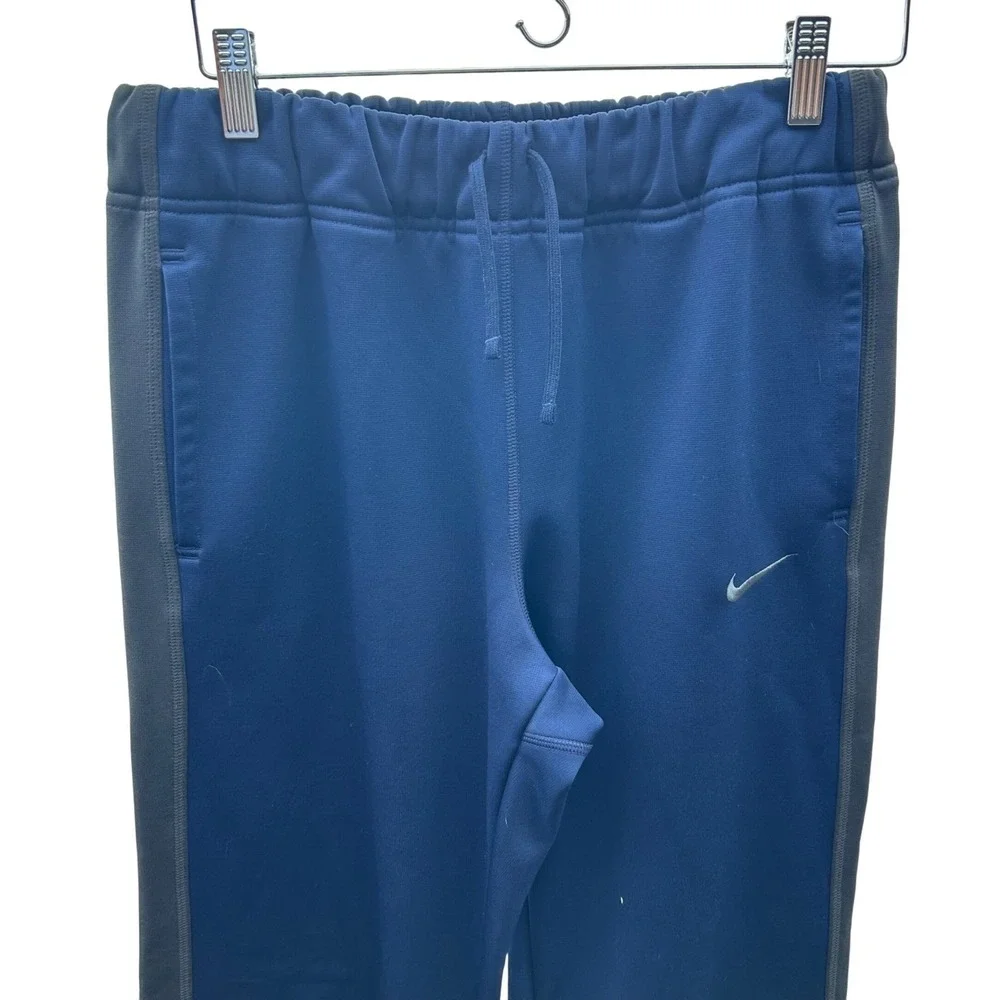 Nike Therma-FIT Track Pants Mens M Blue Side Stripe Ankle Zip Athletic Sport‎
